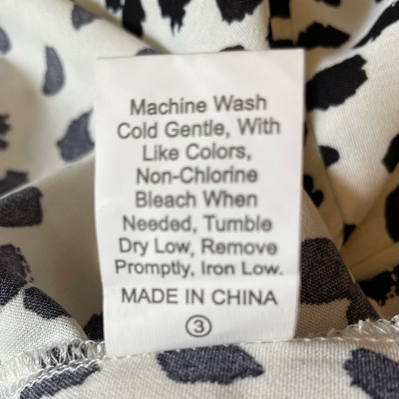 Angashion black and white tunic with peplum - Picture 5 of 8